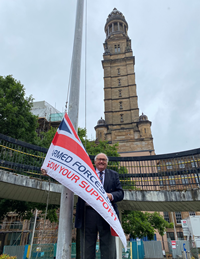 Armed Forces Day Depute Provost Councillor David Wilson raising the flag